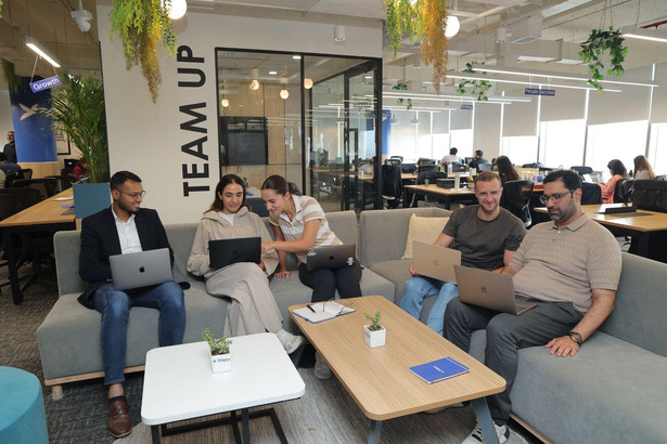 The Shipsy team collaborating in the office